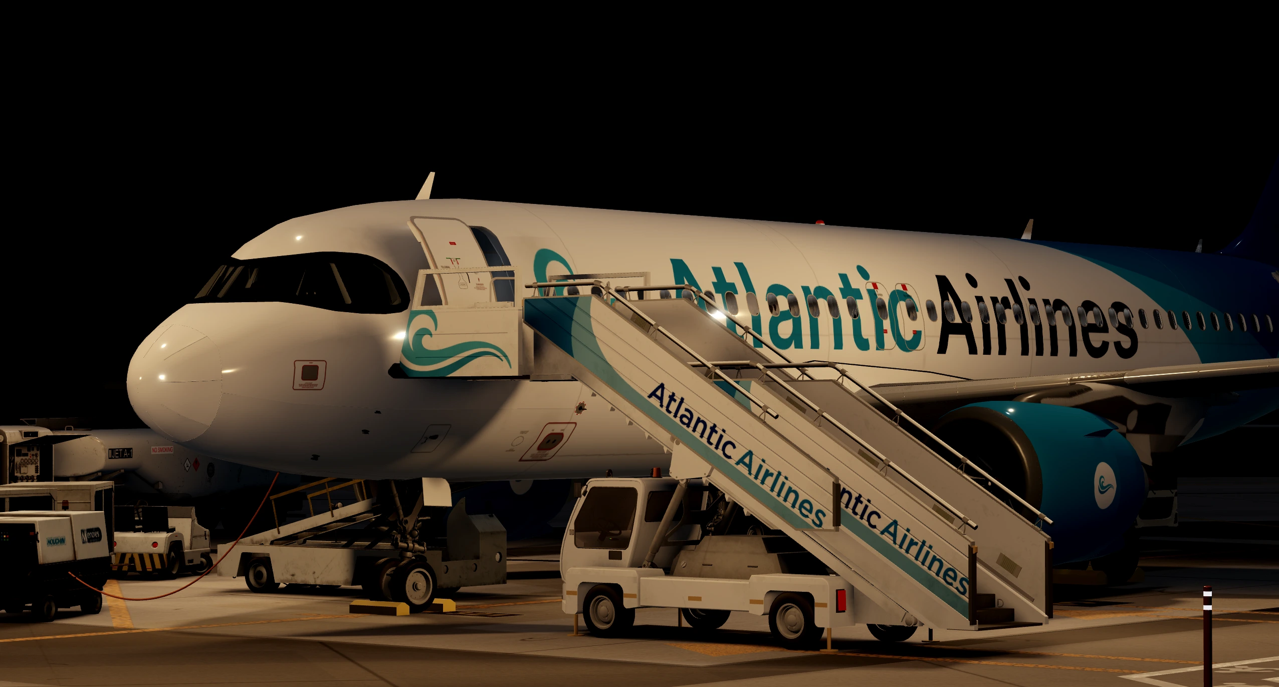 Aircraft parked at the gate in the evening.
